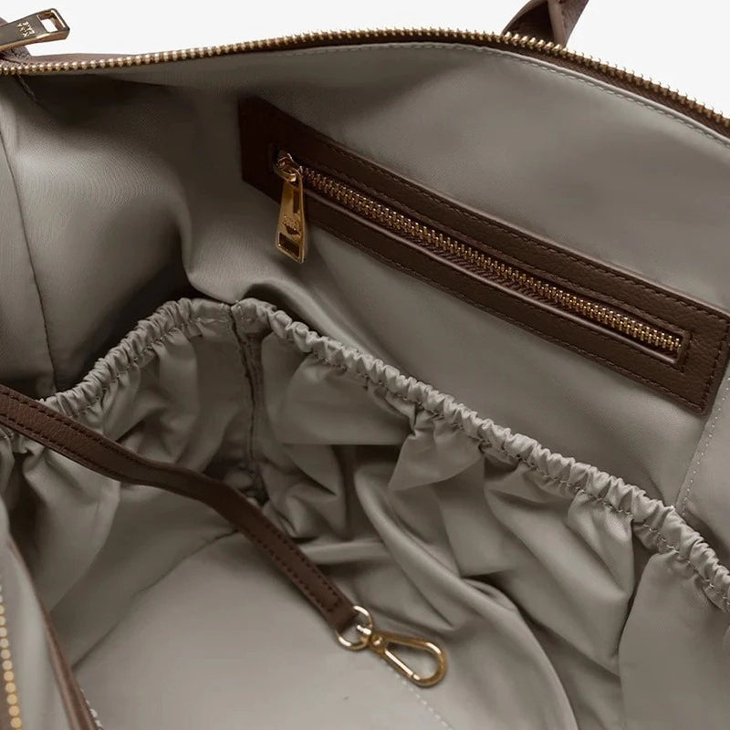Customized PU Leather Three-in-One Portable Handbag Diaper Backpack Travel Shoulder Strap Mother Bag Fashionable Simple Design