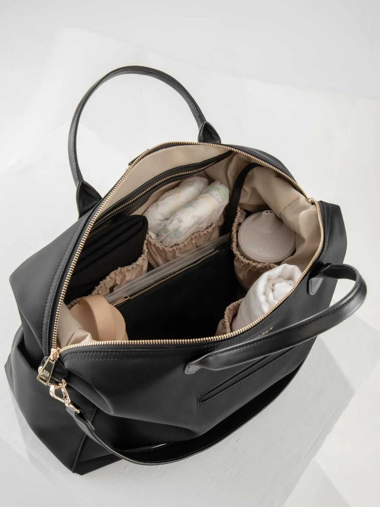 Customized PU Leather Three-in-One Portable Handbag Diaper Backpack Travel Shoulder Strap Mother Bag Fashionable Simple Design